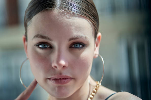 Close-up of a woman with minimal makeup, highlighting natural beauty for a no-makeup makeup look.